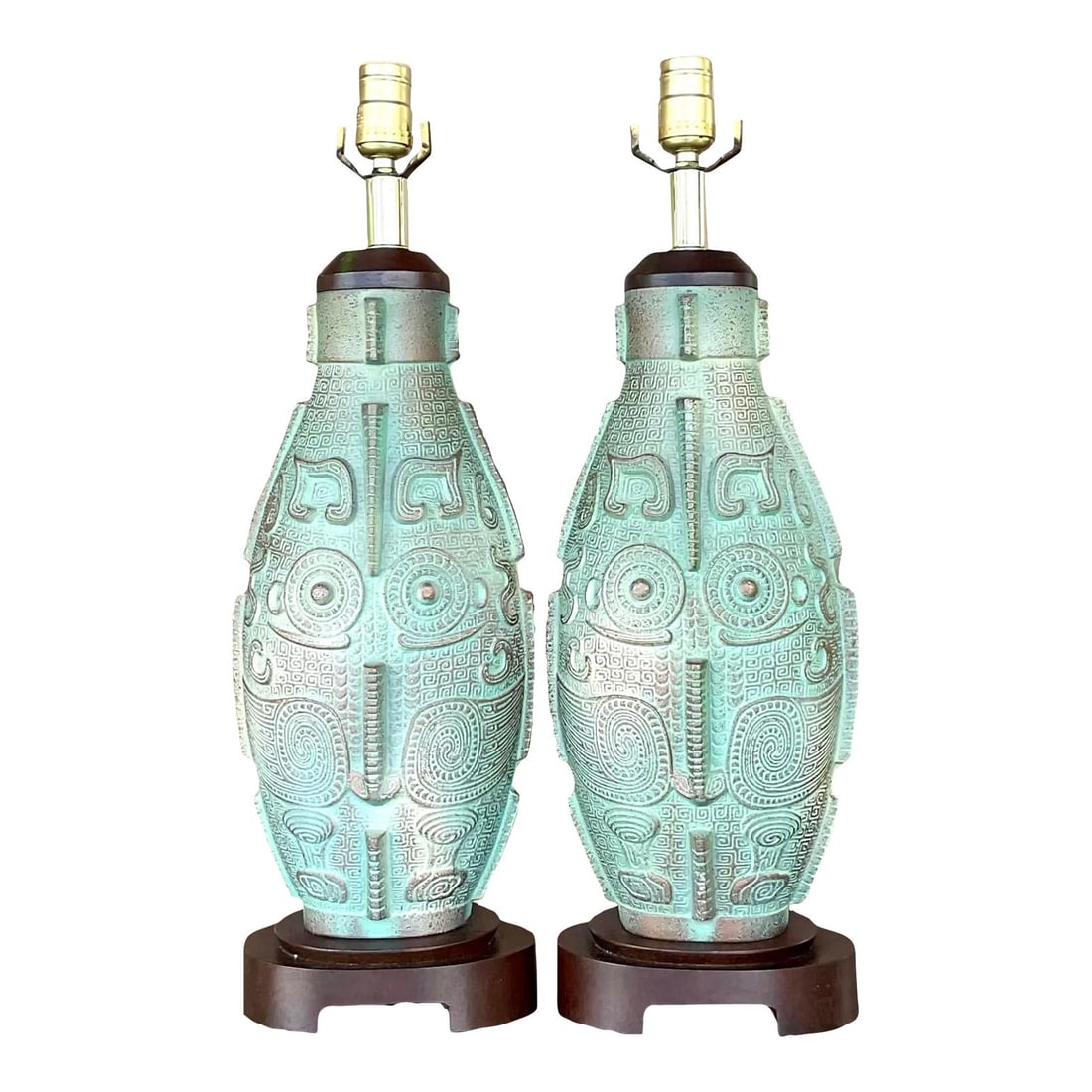 Pair of Vintage Boho Aztec Ceramic Lamps in Turquoise: Pair of Vintage Boho Aztec Ceramic Lamps in Turquoise Add a touch of global style to your home with this pair of vintage boho Aztec ceramic lamps. Each lamp features intricate patterns inspired by anc