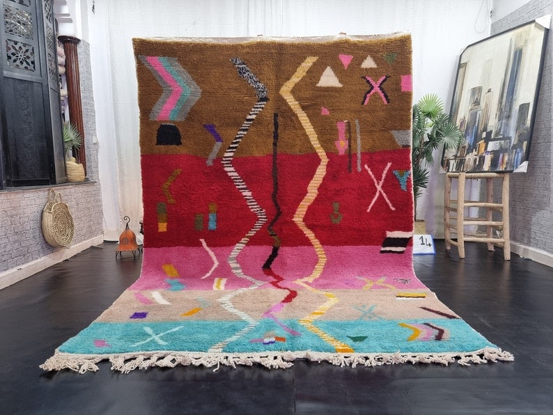 Authentic Handwoven Moroccan Berber Wool Rug 9.84 x 6.56 feet: Authentic Handwoven Moroccan Berber Wool Rug 9.84 x 6.56 feet Discover the beauty of this stunning handwoven Moroccan Berber wool rug. Crafted by skilled local Berber women in the Atlas mountains, thi