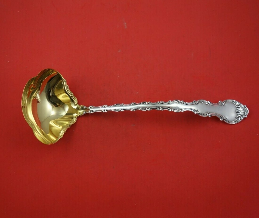 Gorham Strasbourg Sterling Silver Soup Ladle 12.5" Gold Wash Lacing: Gorham Strasbourg Sterling Silver Soup Ladle 12.5" Gold Wash Lacing Enhance your dining experience with this exquisite Strasbourg soup ladle by Gorham. Made from high-quality sterling silver, this lad