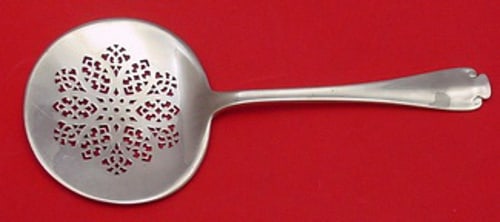 Tiffany & Co. Flemish Sterling Silver Tomato Server 7 7/8": Tiffany & Co. Flemish Sterling Silver Tomato Server 7 7/8" This exquisite tomato server, crafted by Tiffany & Co., is a stunning example of the Flemish pattern. Made of high-quality sterling silver, t