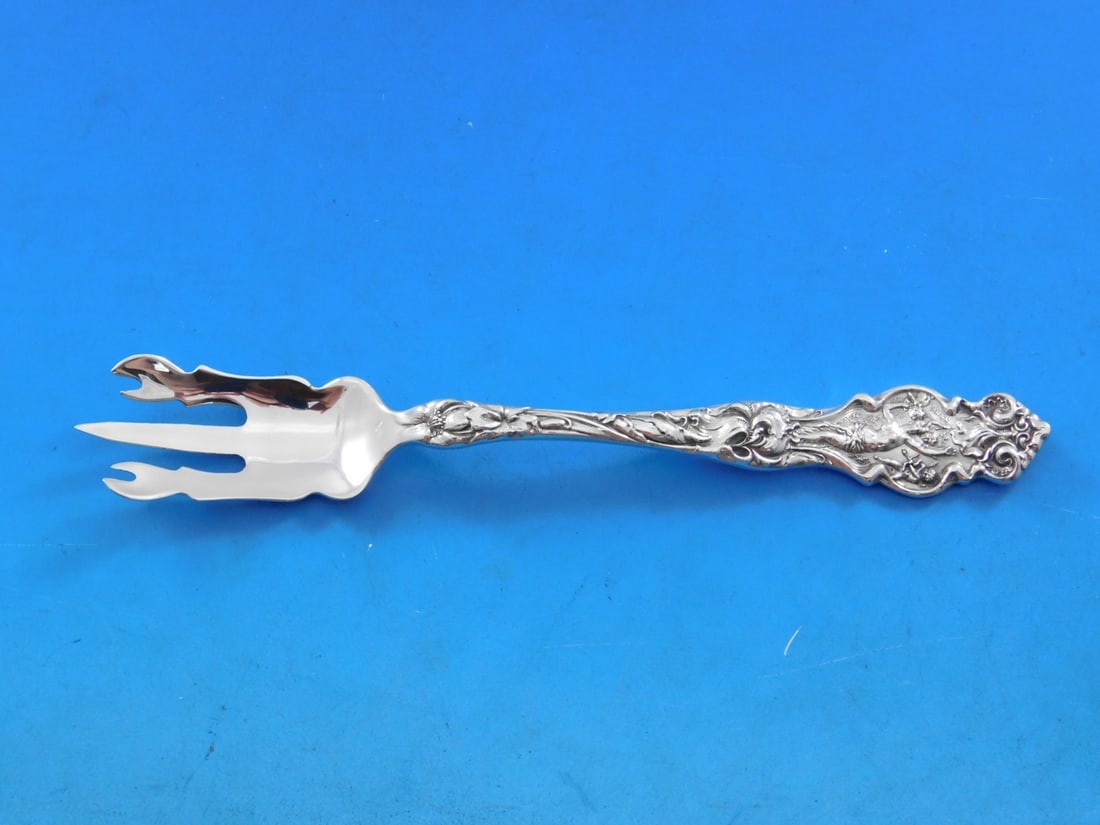 Wallace Irian Sterling Silver Custom Made Lobster Pick 6 Inch: Wallace Irian Sterling Silver Custom Made Lobster Pick 6 Inch Discover the exquisite craftsmanship of the Irian pattern by Wallace with this custom-made sterling silver lobster pick. Measuring 6 inche