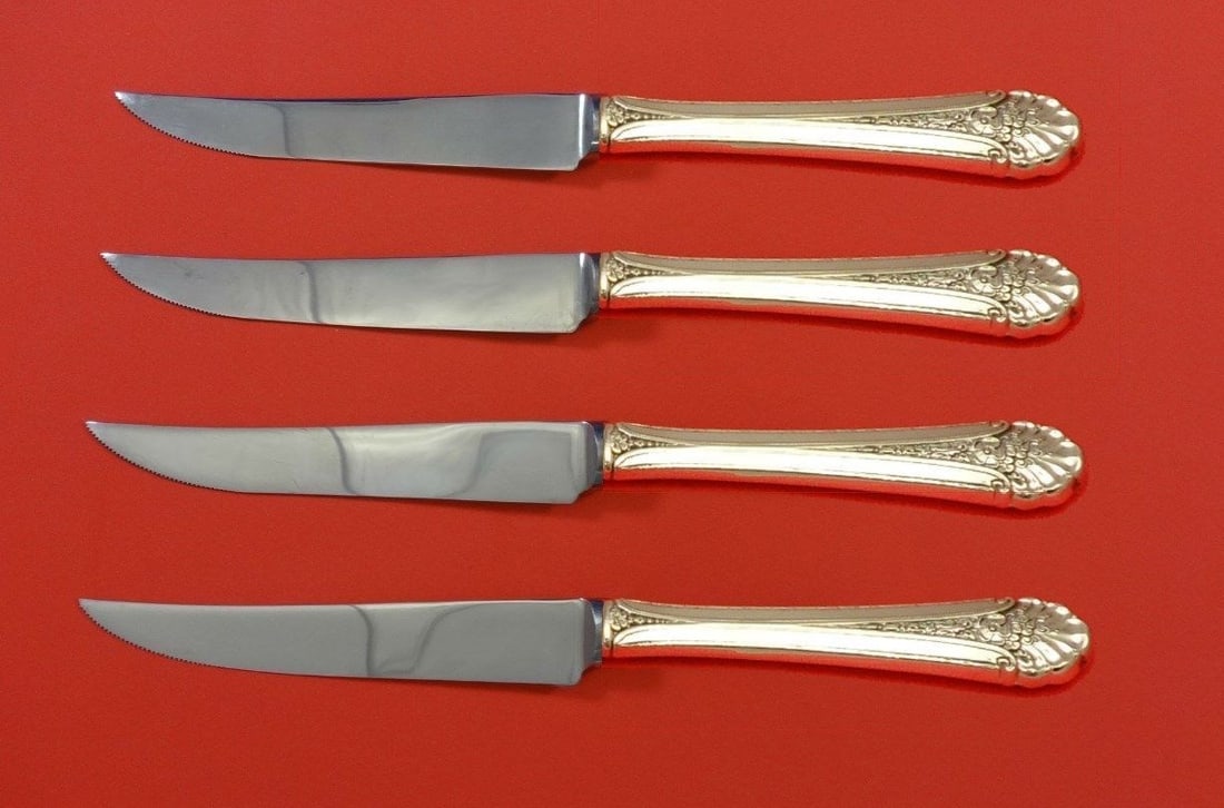 Towle Royal Windsor 4pc Sterling Silver Steak Knife Set 8.5": Towle Royal Windsor 4pc Sterling Silver Steak Knife Set 8.5" This exquisite 4-piece steak knife set features the Royal Windsor pattern by Towle, expertly crafted from sterling silver. Each knife is de