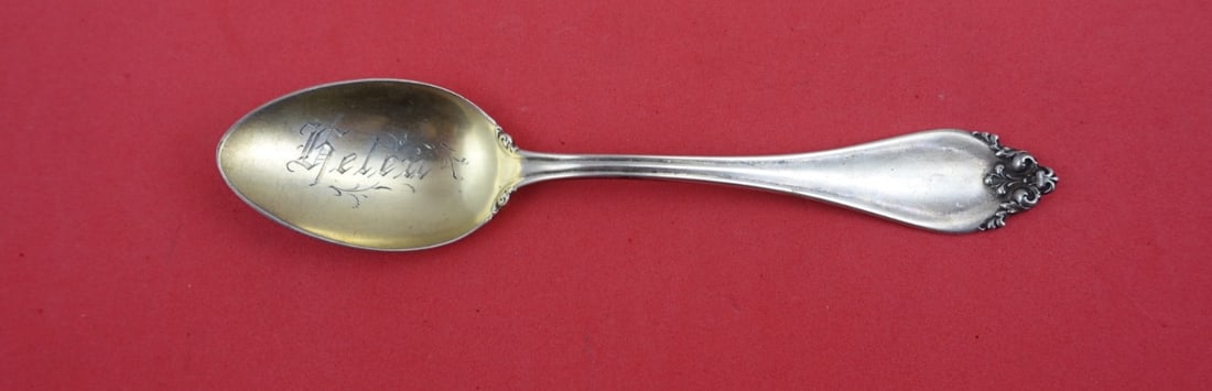 Reed and Barton La Perle Sterling Silver Teaspoon Gold Washed Monogrammed Helen 6": Reed and Barton La Perle Sterling Silver Teaspoon Gold Washed Monogrammed Helen 6" This exquisite La Perle teaspoon by Reed and Barton is crafted from high-quality sterling silver. It features a beaut