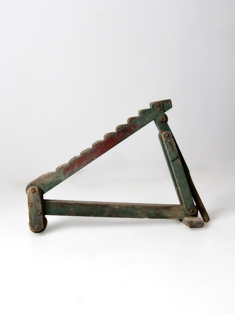 19th Century Wooden Wagon Jack with Green Paint and Triangular Frame: 19th Century Wooden Wagon Jack with Green Paint and Triangular Frame This 19th-century antique primitive wagon jack features a triangular wooden frame and a stepped ratcheting arm, creating a bold geo