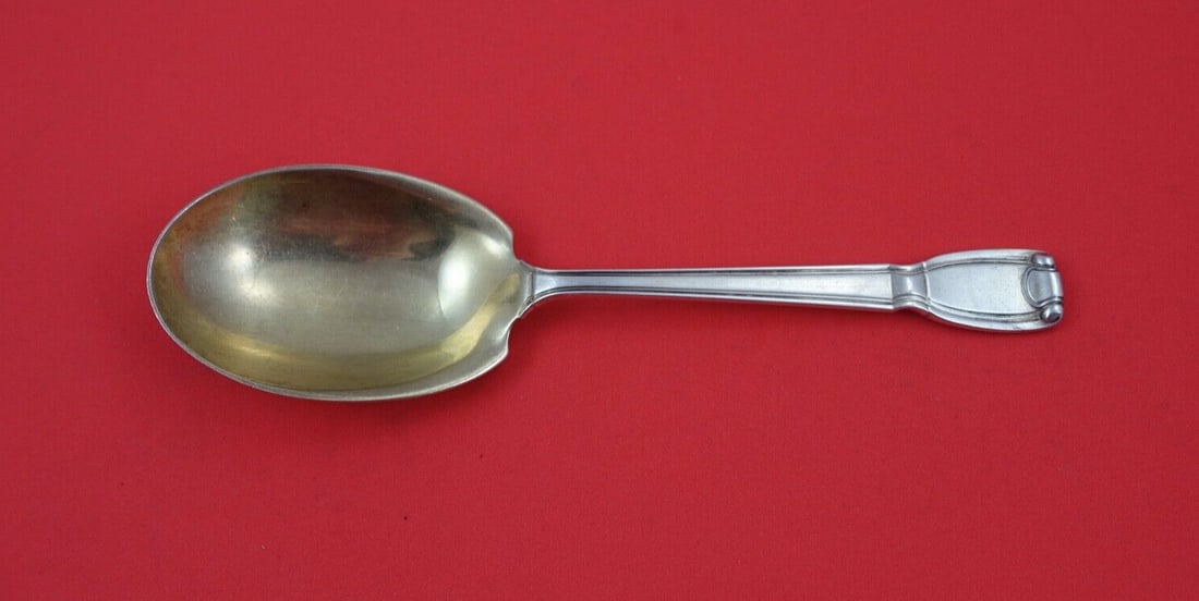 Tiffany & Co Castilian Gold Washed Sterling Silver Preserve Spoon 7 3/4": Tiffany & Co Castilian Gold Washed Sterling Silver Preserve Spoon 7 3/4" This exquisite preserve spoon from Tiffany & Co. features the elegant Castilian pattern, a hallmark of fine craftsmanship. Made