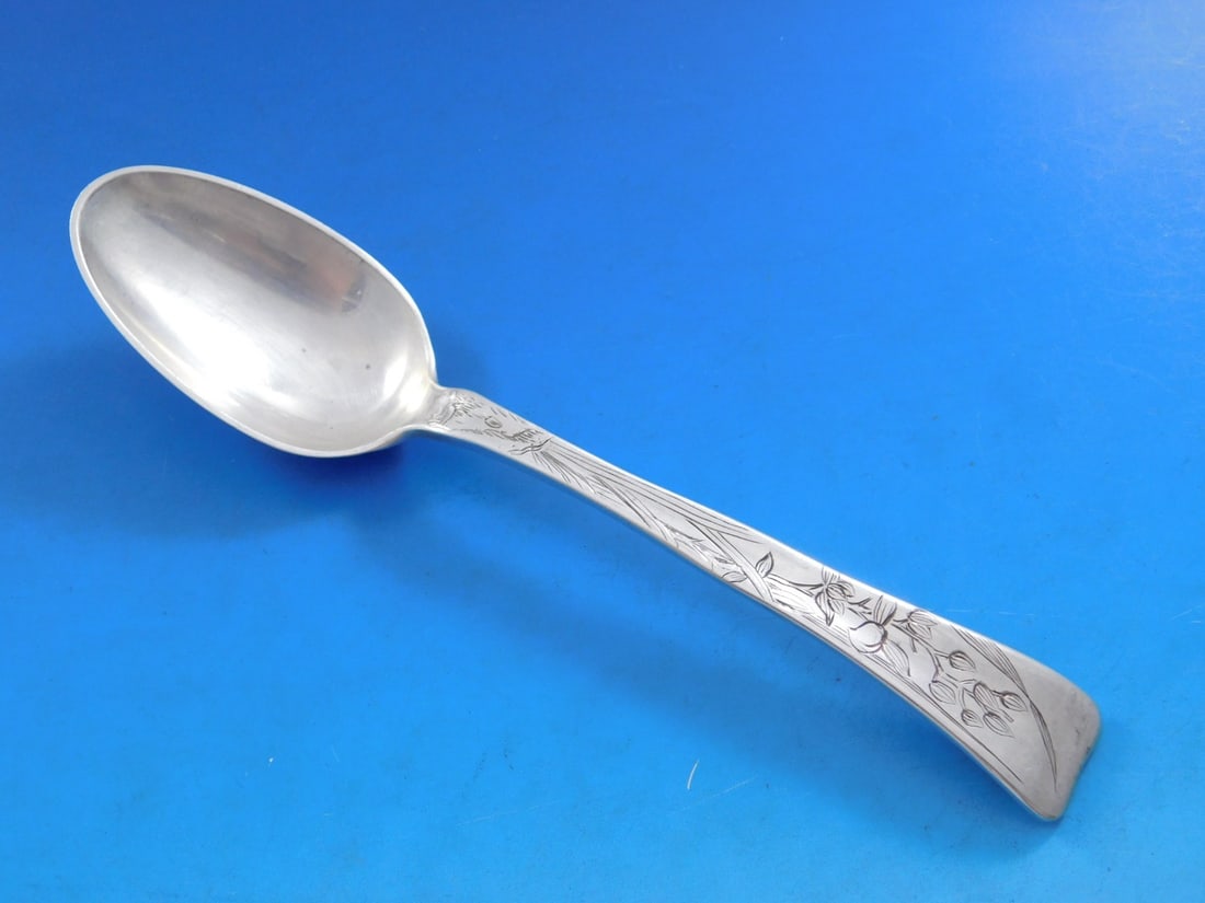 Tiffany Sterling Silver 7 Inch Lap Over Edge Soup Spoon Orchids: Tiffany Sterling Silver 7 Inch Lap Over Edge Soup Spoon Orchids This exquisite soup spoon from Tiffany & Co. features the elegant Lap Over Edge pattern, acid etched with delicate orchid motifs. Crafte