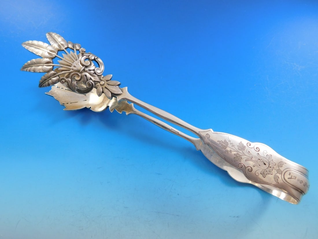 Sterling Silver Bright Cut Ice Tong 9 1/4 inch Fancy Cast Tines 1869: Sterling Silver Bright Cut Ice Tong 9 1/4 inch Fancy Cast Tines 1869 An early handmade sterling silver bright-cut ice tong dated 1869, featuring a fancy cast serving area and a monogram with an "a" pl