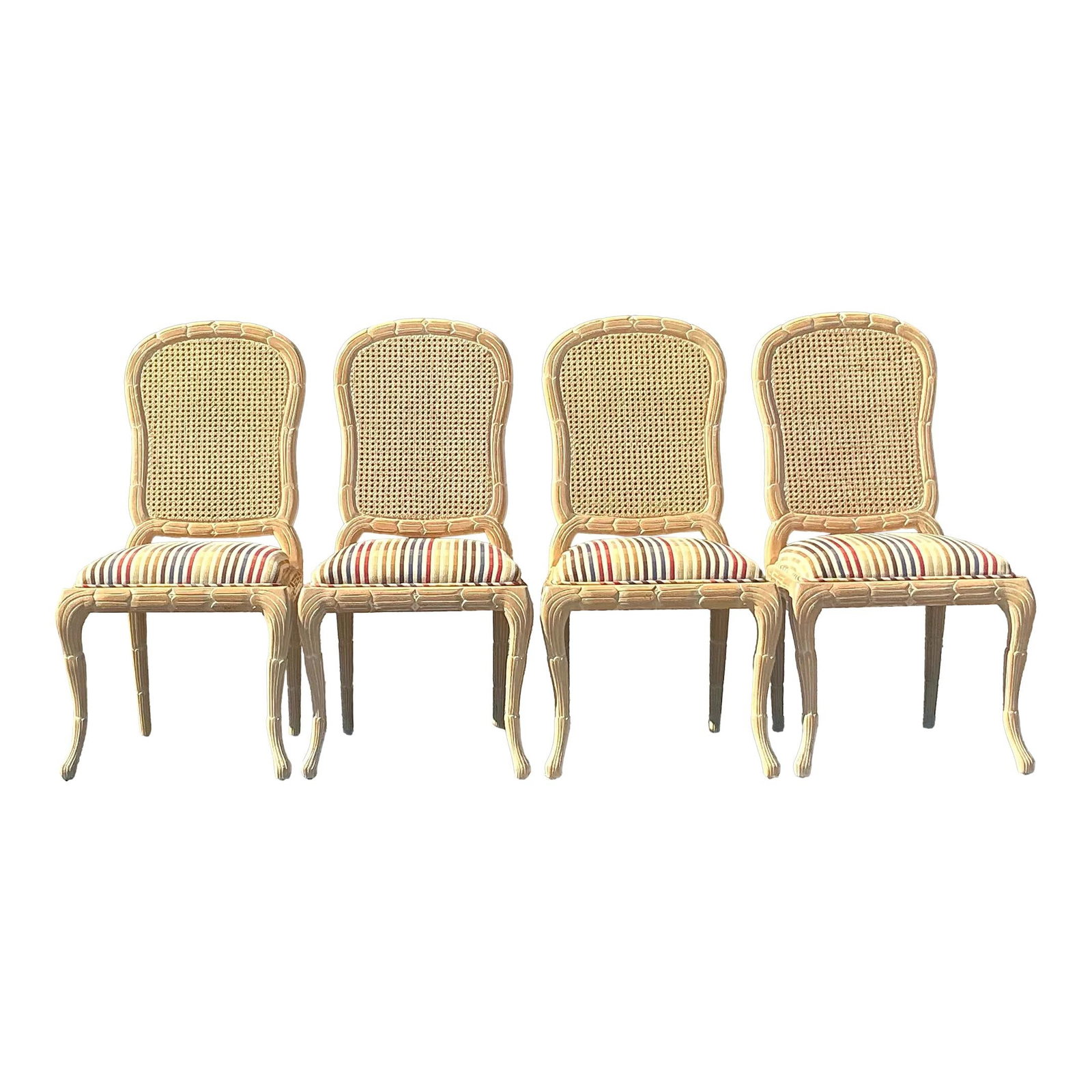 Vintage Regency Cane Dining Chairs Faux Bois Design Set of 4: Vintage Regency Cane Dining Chairs Faux Bois Design Set of 4 This set of four vintage Regency dining chairs features a stunning faux bois design complemented by elegant cane backs, harmonizing natural