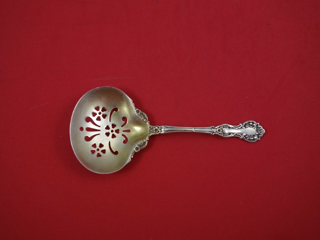 Gorham Fleury Sterling Silver Nut Spoon Goldwashed 4.5": Gorham Fleury Sterling Silver Nut Spoon Goldwashed 4.5" This exquisite nut spoon from the Fleury pattern by Gorham showcases a beautiful blend of elegance and functionality. Crafted from high-quality 