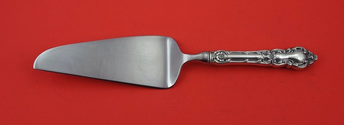 Wallace Meadow Rose Sterling Silver Pie Server 10 3/4": Wallace Meadow Rose Sterling Silver Pie Server 10 3/4" Presenting the Meadow Rose Pie Server by Wallace, a stunning addition to your tableware collection. Crafted from high-quality sterling silver, th