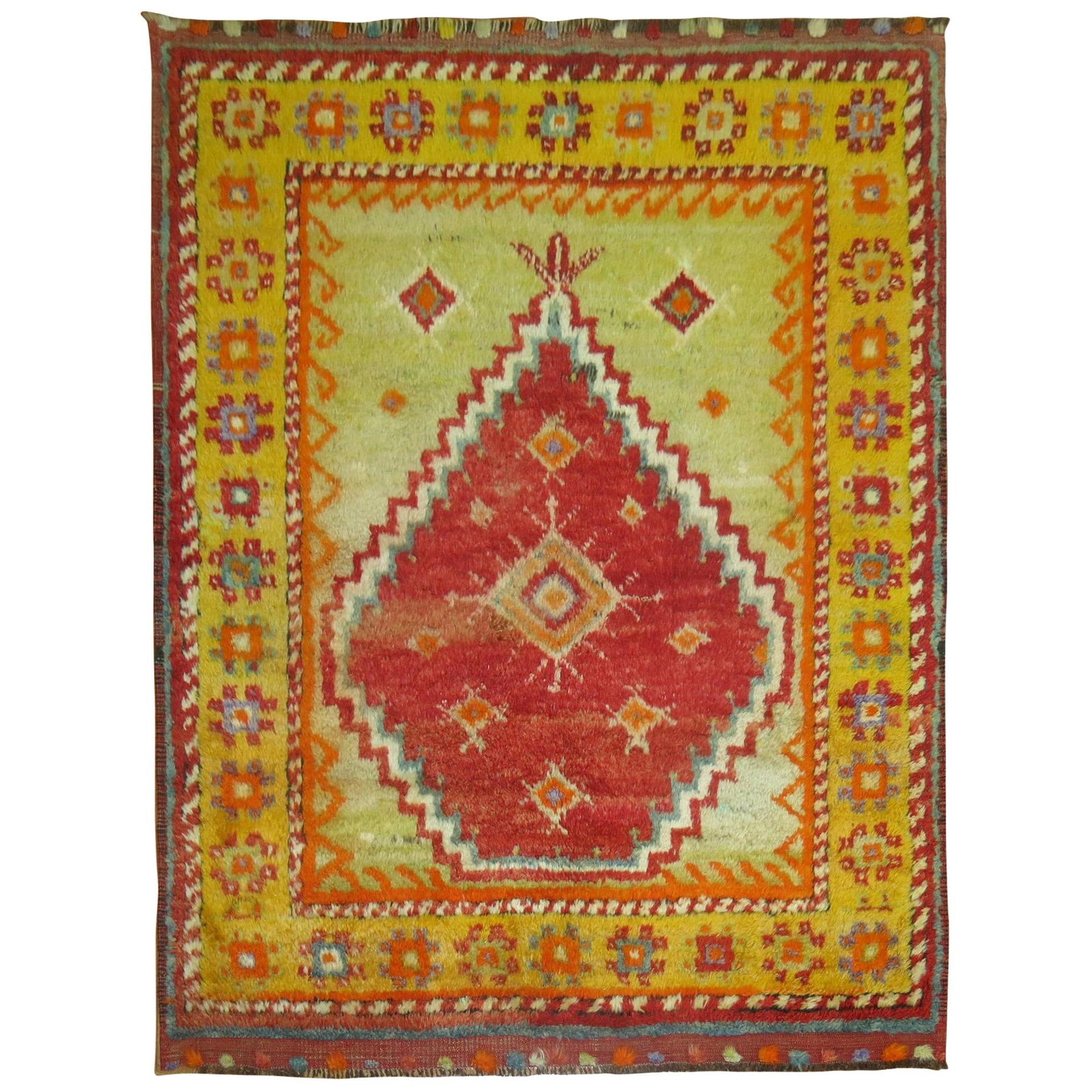4' x 4'9" Hand Knotted Angora Turkish Tulu Rug circa 1940: 4' x 4'9" Hand Knotted Angora Turkish Tulu Rug circa 1940 This vibrant Vintage Turkish Tulu Square Carpet features a striking combination of saturated red, lime green, and orange tones. Hand-knotted f