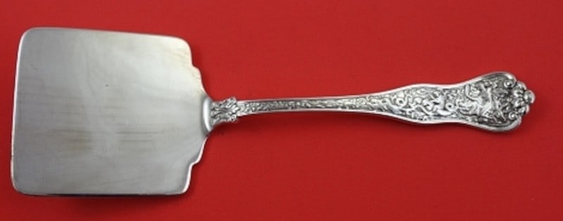 Tiffany and Co Olympian Sterling Silver Waffle Server 9 in: Tiffany and Co Olympian Sterling Silver Waffle Server 9 in Tiffany & Co. Olympian sterling silver waffle server in the multi-motif Olympian pattern. The piece is not monogrammed and is described as be