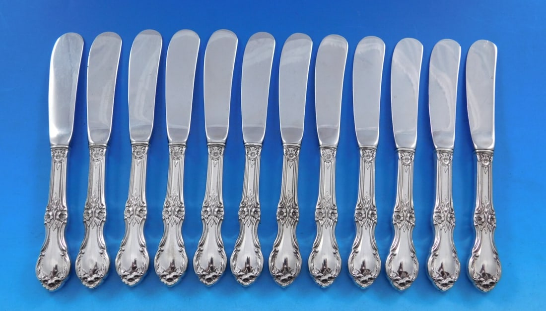 International Sterling Silver Wild Rose Butter Spreader Set 12 pcs 5 7/8": International Sterling Silver Wild Rose Butter Spreader Set 12 pcs 5 7/8" Enhance your dining experience with this exquisite set of 12 butter spreaders from the Wild Rose pattern by International Ster