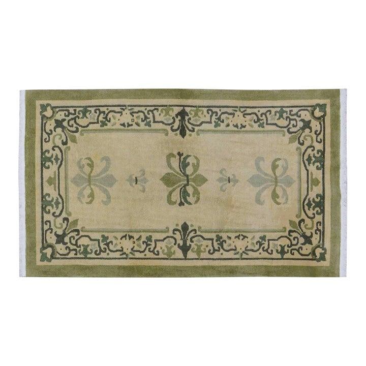 Hand-Knotted Wool Art Deco Rug Olive 4'x6'9" Chinese Vintage: Hand-Knotted Wool Art Deco Rug Olive 4'x6'9" Chinese Vintage This vintage Chinese Art Deco rug is hand-knotted from wool using traditional rug-making techniques. It features a rich olive color and a t