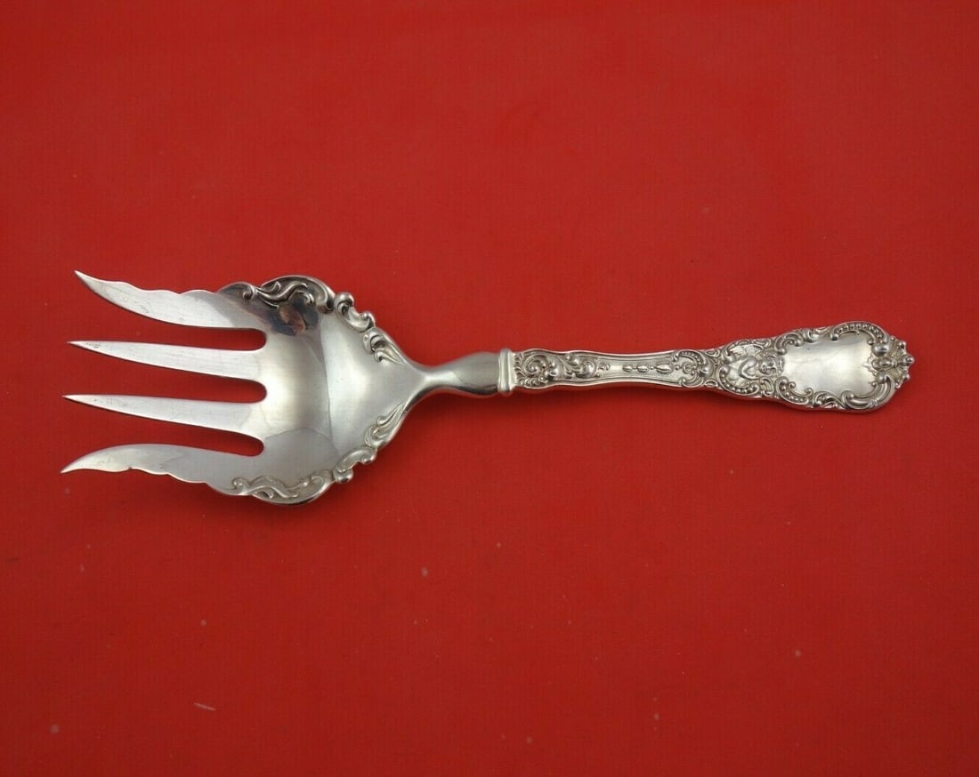 Dominick & Haff Cupid Sterling Silver Salad Serving Fork 9": Dominick & Haff Cupid Sterling Silver Salad Serving Fork 9" This exquisite salad serving fork, part of the Cupid pattern by Dominick & Haff, showcases the elegance and craftsmanship of the late 19th c