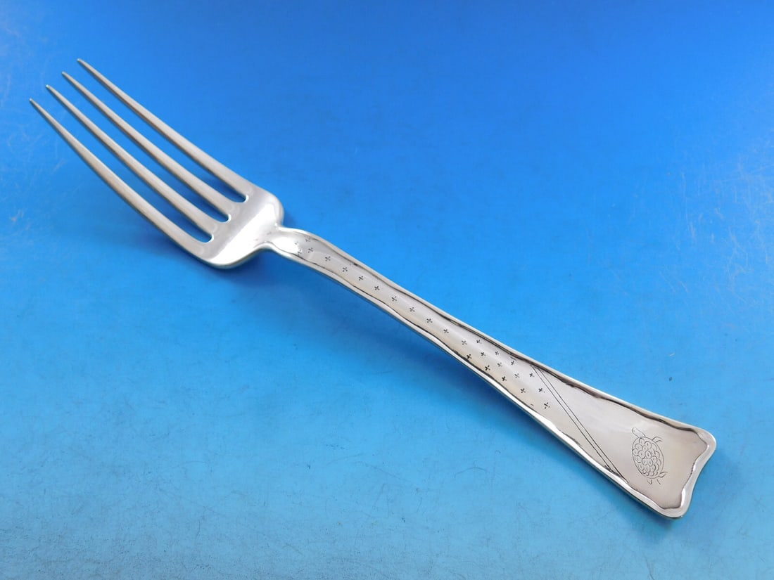 Tiffany & Co. Sterling Silver Dinner Fork Lap Over Edge Turtle 8 1/8": Tiffany & Co. Sterling Silver Dinner Fork Lap Over Edge Turtle 8 1/8" This exquisite dinner fork from Tiffany & Co. features the elegant Lap Over Edge pattern. Crafted from high-quality sterling silve