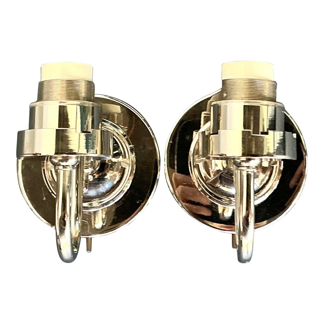 Pair of Polished Nickel Wall Sconces with Scroll Arms by Vaughan: Pair of Polished Nickel Wall Sconces with Scroll Arms by Vaughan This pair of vintage Vaughan wall sconces features a polished nickel finish and a classic boho-inspired design. Each sconce is expertly