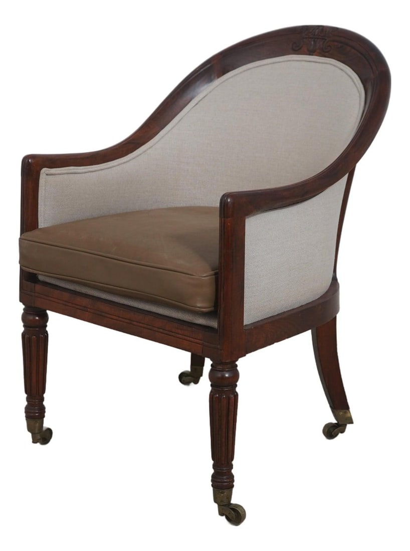 English Regency Rosewood Arm Chair Brass Capped Feet: English Regency Rosewood Arm Chair Brass Capped Feet This antique English Regency chair dates from approximately 1820 to 1860 and features a high-quality solid rosewood frame. The chair is designed on