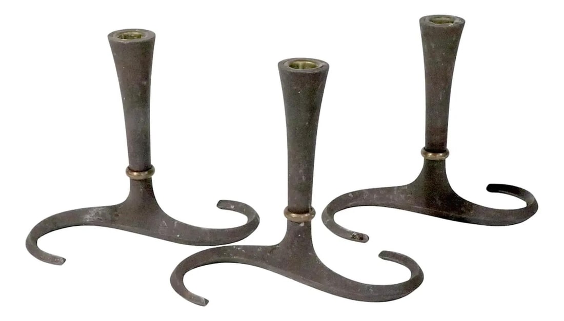 3 Quistgaard for Dansk iron brass candlesticks Danish modern: 3 Quistgaard for Dansk iron brass candlesticks Danish modern A set of three mid-century Danish modern candlesticks designed by Jens Quistgaard for Dansk, circa the 1960s. Made of iron and brass, they 