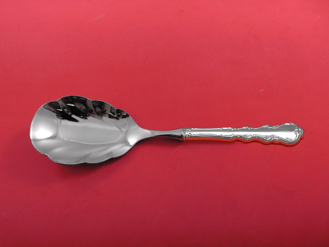 International Silver Angelique Sterling Silver Rice Spoon 10 Inch Custom Made: International Silver Angelique Sterling Silver Rice Spoon 10 Inch Custom Made This exquisite rice spoon is part of the Angelique pattern by International Sterling. Crafted from sterling silver, it fea