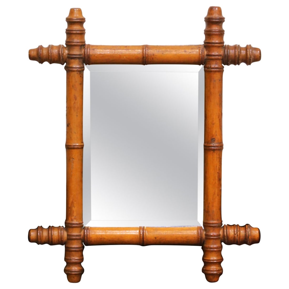 Petite French Faux Bamboo Mirror With Beveled Mercury Glass Circa 1920: Petite French Faux Bamboo Mirror With Beveled Mercury Glass Circa 1920 This early 20th-century French wall mirror features a finely hand-crafted faux bamboo frame made from walnut, highlighted by a wa