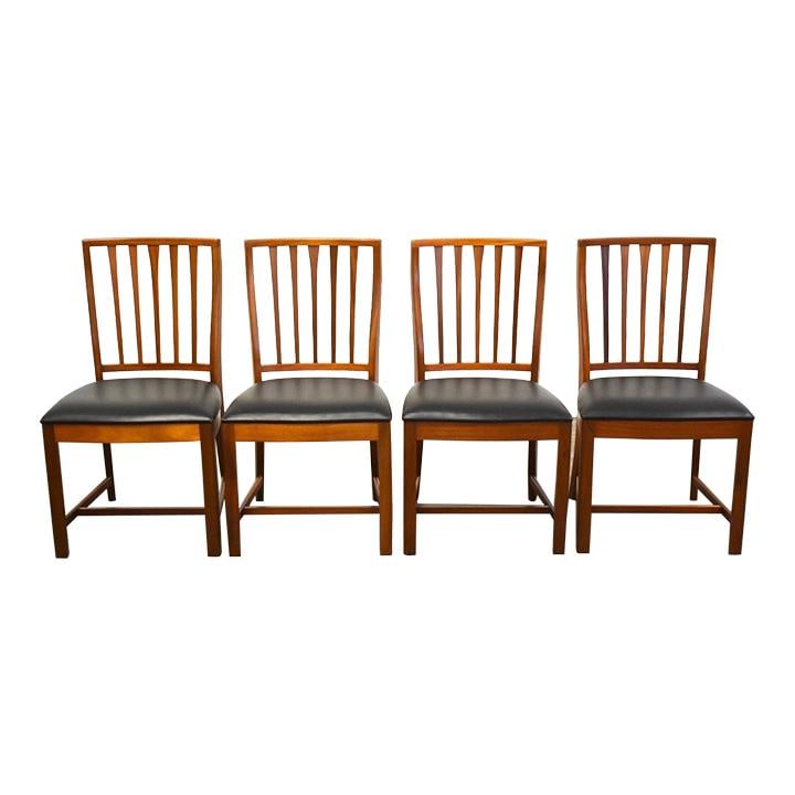 Elegant Mid Century Dining Chairs Set of 4 Mahogany Frame Black Vinyl: Elegant Mid Century Dining Chairs Set of 4 Mahogany Frame Black Vinyl Enhance your dining experience with this elegant set of four mid-century modern dining chairs. Crafted with a sturdy mahogany fram