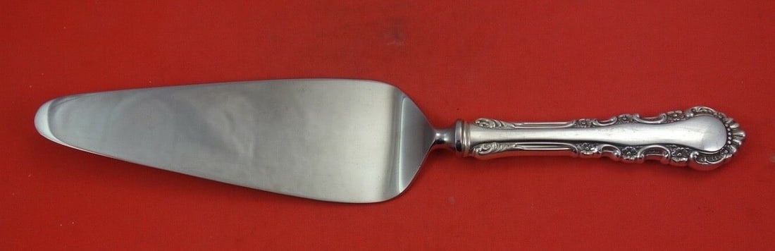 Reed and Barton Georgian Rose Sterling Silver Pie Server 10 1/4 inches: Reed and Barton Georgian Rose Sterling Silver Pie Server 10 1/4 inches Presenting the exquisite Georgian Rose Pie Server by Reed and Barton, an elegant addition to your tableware. This narrow pie serv