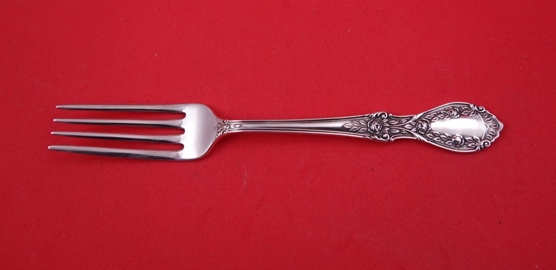 Manchester American Beauty Sterling Silver Dinner Fork 7 1/2": Manchester American Beauty Sterling Silver Dinner Fork 7 1/2" Sterling silver dinner fork in the American Beauty pattern by Manchester. It measures 7 1/2 inches and is not monogrammed. The piece is pr