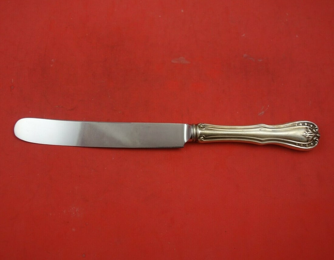 Reed and Barton Devon Sterling Silver Dinner Knife 9 3/4" Blunt Blade: Reed and Barton Devon Sterling Silver Dinner Knife 9 3/4" Blunt Blade This exquisite dinner knife is part of the Devon pattern by Reed and Barton, crafted from high-quality sterling silver. The knife 