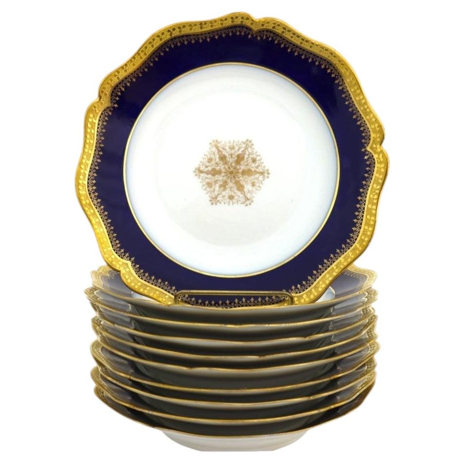 Set of 10 Limoges cobalt blue porcelain soup bowls gold trim c1900: Set of 10 Limoges cobalt blue porcelain soup bowls gold trim c1900 This set includes ten antique French Limoges porcelain soup bowls from around 1900. Each bowl features a cobalt blue border with intr