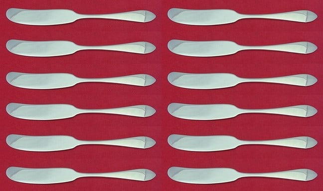 Tiffany & Co. Faneuil Sterling Silver Butter Spreader Set of 12 pcs 5 7/8": Tiffany & Co. Faneuil Sterling Silver Butter Spreader Set of 12 pcs 5 7/8" Elevate your dining experience with this exquisite set of 12 butter spreaders from the renowned Faneuil pattern by Tiffany & 