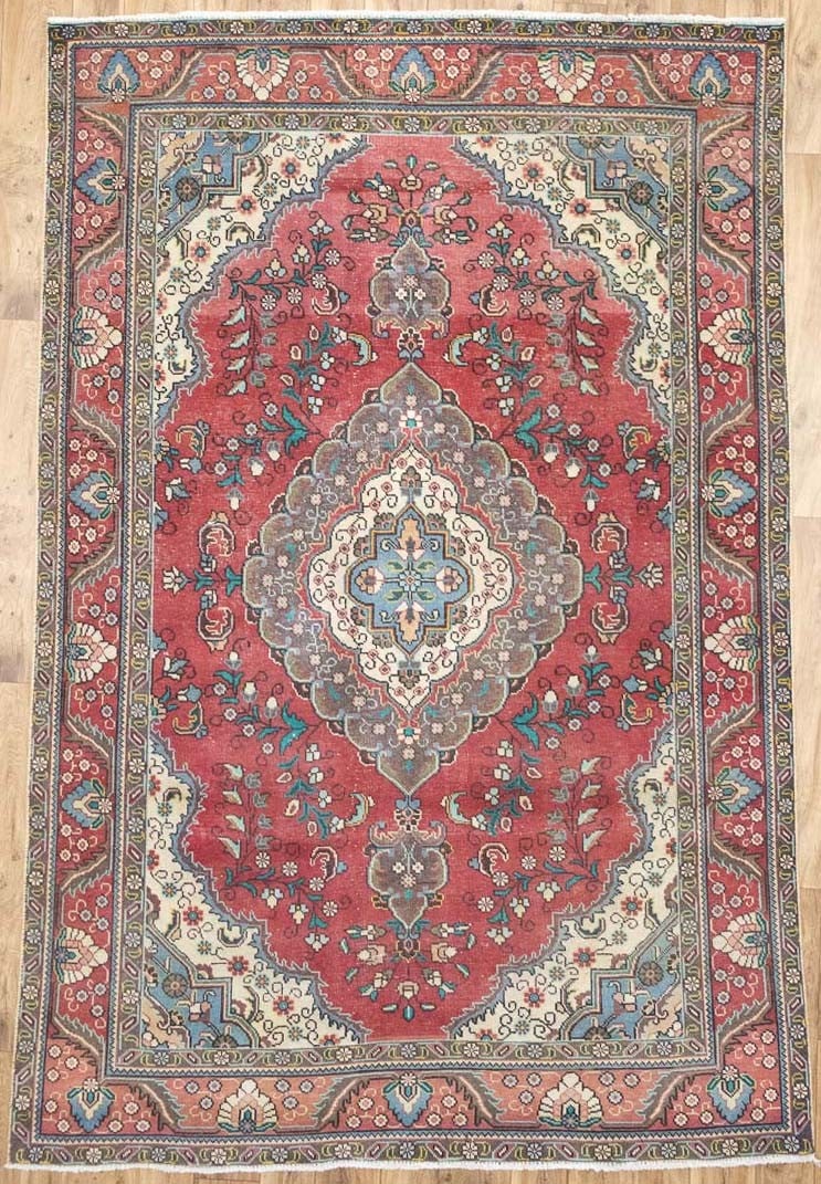 Hand Knotted Wool Floral Oriental Area Rug 6'2 x 9'6: Hand Knotted Wool Floral Oriental Area Rug 6'2 x 9'6 This semi-antique hand-knotted wool Oriental rug features a distressed floral pattern with muted colors, including red, cream, light blue, pastel y