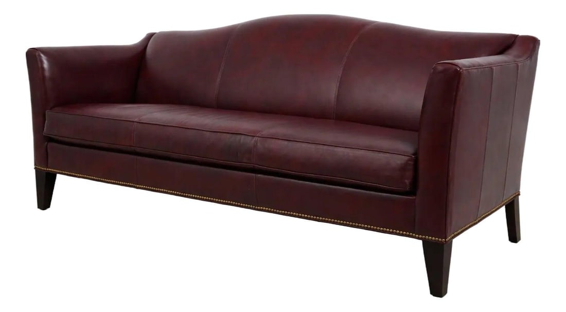 Burgundy Leather Modern Sofa with Tack Trim 85 Inch: Burgundy Leather Modern Sofa with Tack Trim 85 Inch This modern sofa by Ethan Allen features high-quality burgundy leather upholstery with tack head trim. Expertly constructed, it showcases a clean, w