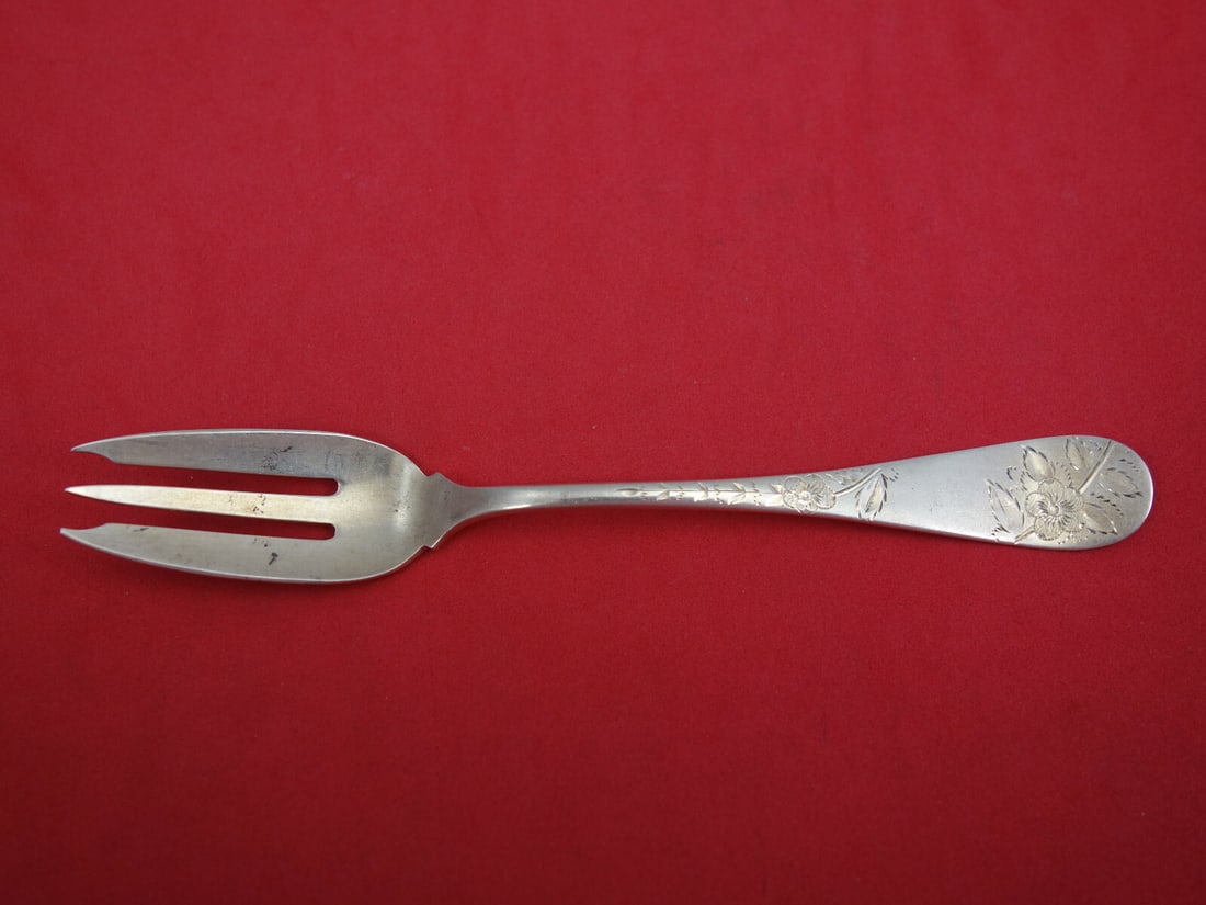 Dominick Haff sterling pastry fork Old English floral pansy 5 3 8: Dominick Haff sterling pastry fork Old English floral pansy 5 3 8 This is a sterling silver pastry fork crafted by Dominick & Haff in the Old English Antique Eng with Flowers pattern. The fork feature
