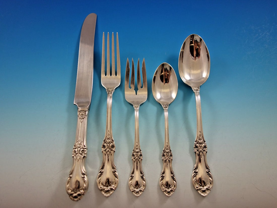 International Sterling Silver Wild Rose Flatware Set 30 Pcs for 6 with Caddy: International Sterling Silver Wild Rose Flatware Set 30 Pcs for 6 with Caddy Experience the elegance of the Wild Rose Sterling Silver Flatware Set, designed by International Silver. This exquisite pos