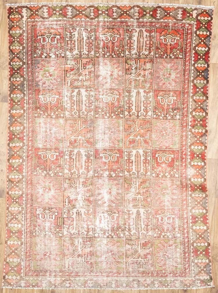Hand Knotted Wool Tribal Floral Area Rug 6'6 x 8'11: Hand Knotted Wool Tribal Floral Area Rug 6'6 x 8'11 This semi-antique hand-knotted carpet features a distressed floral and tribal design in muted tones of red, cream, pastel brown, dark brown, and bei
