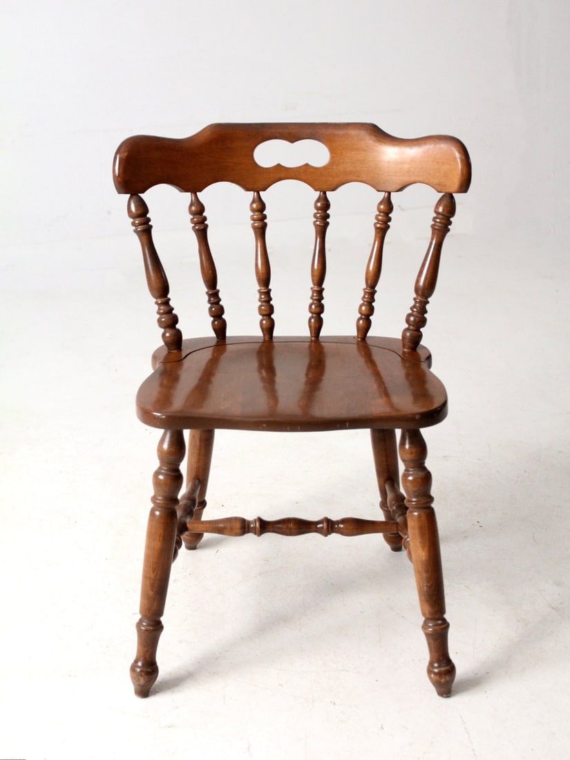American Colonial Vintage Pub Chair with Spindle Back and Crest Rail: American Colonial Vintage Pub Chair with Spindle Back and Crest Rail This vintage pub chair exemplifies American Colonial style with its spindle back, turned legs, and a crest rail handle for effortle