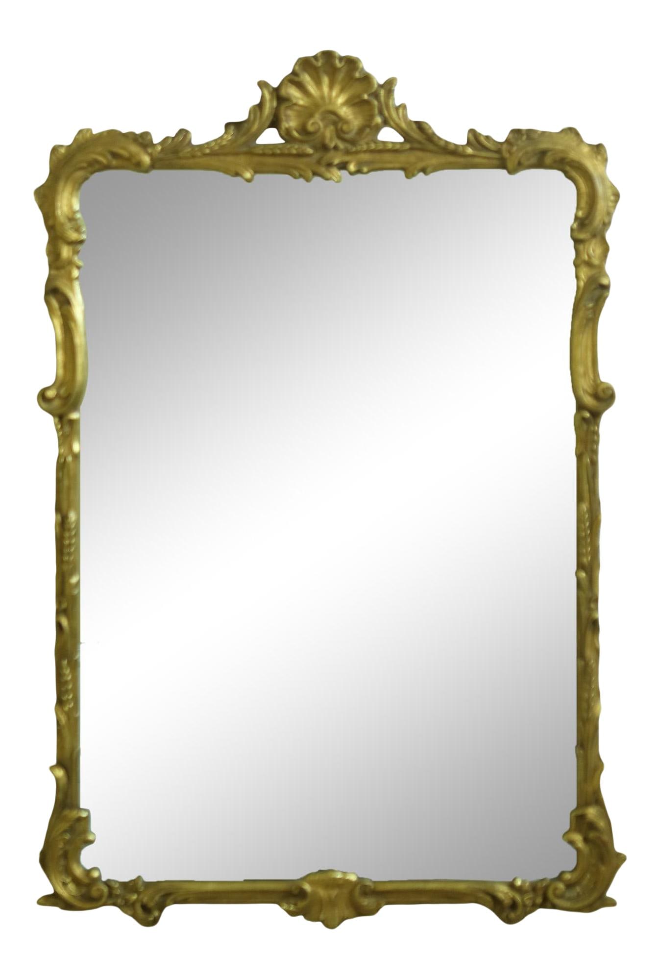 Chippendale Style Gold Gilt Shell Top Mirror by Friedman Brothers: Chippendale Style Gold Gilt Shell Top Mirror by Friedman Brothers This exquisite Chippendale Style mirror features a stunning gold framed shell top design, showcasing high-quality craftsmanship. Appro
