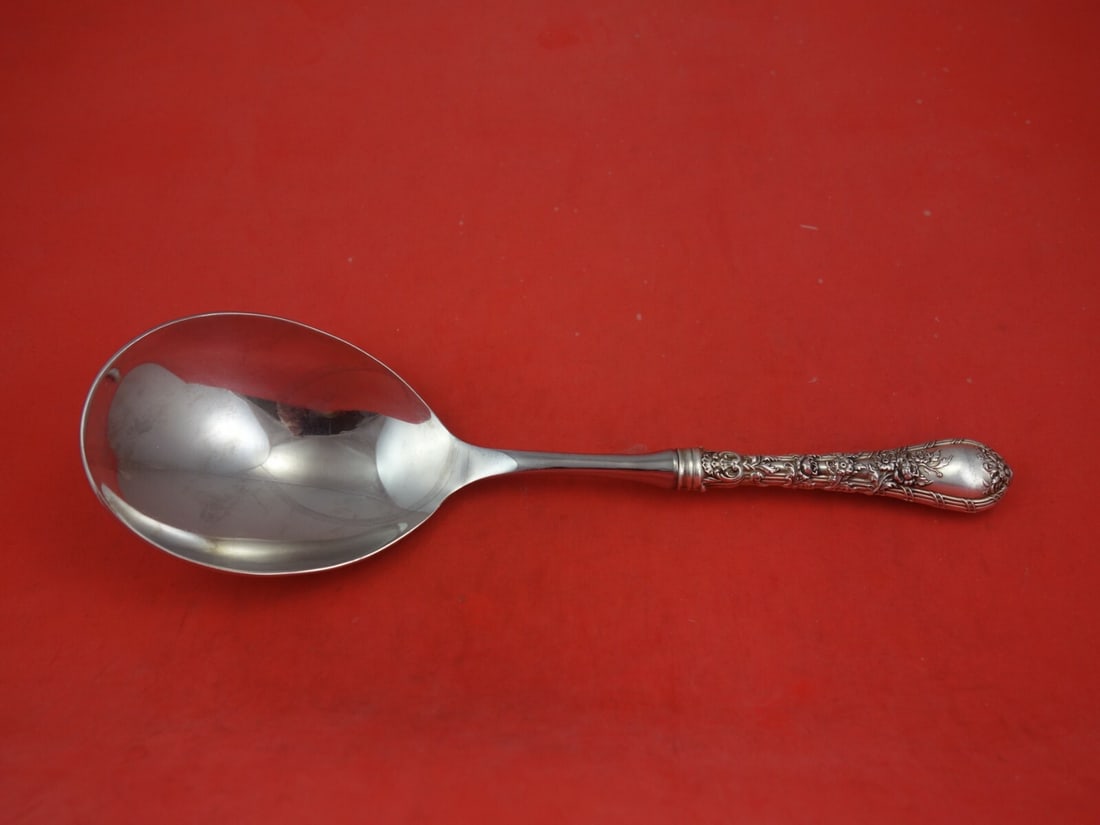 Dauphin Pattern Sterling Silver Berry Spoon by Gorham 10 1/2": Dauphin Pattern Sterling Silver Berry Spoon by Gorham 10 1/2" Presenting the Dauphin pattern berry spoon by Durgin-Gorham, expertly crafted from sterling silver. This exquisite serving spoon features 