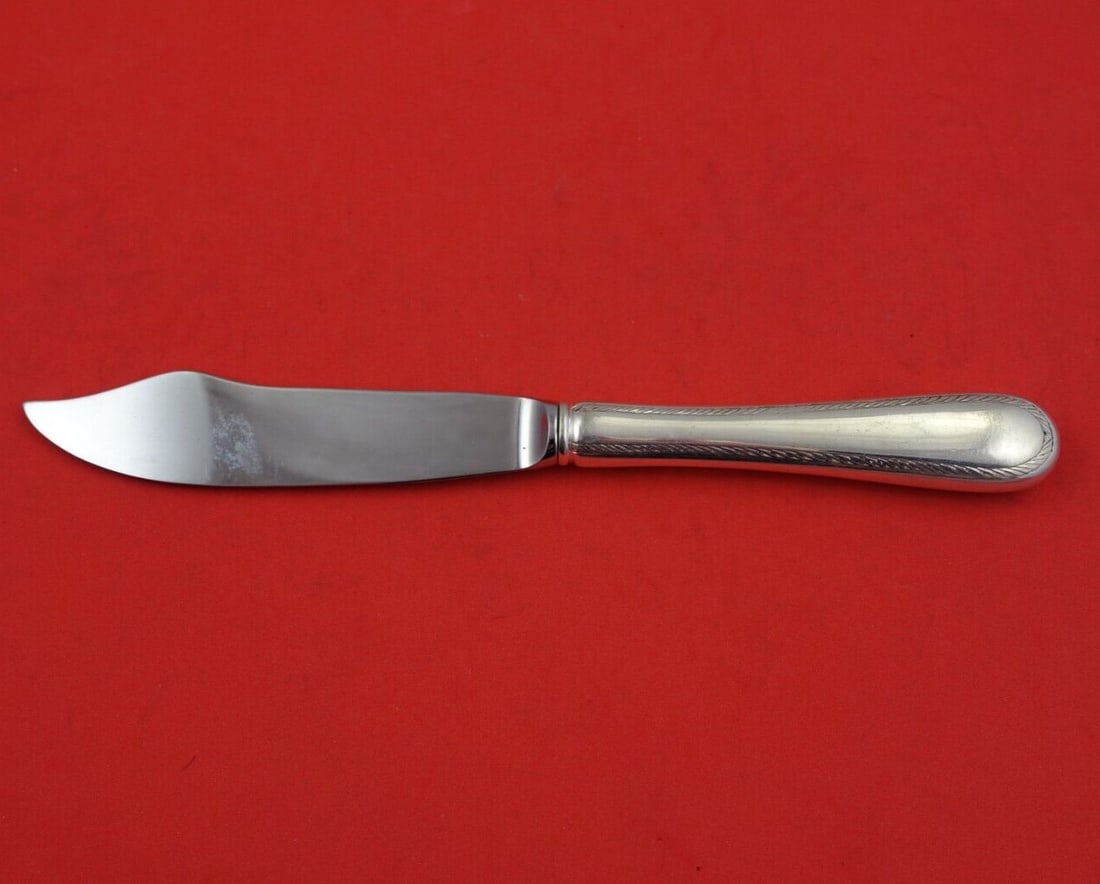 Tuttle Feather Edge Sterling Silver Fish Knife 8 1/4 Inch: Tuttle Feather Edge Sterling Silver Fish Knife 8 1/4 Inch This exquisite Feather Edge fish knife by Tuttle is crafted from sterling silver and features a stainless steel blade. Measuring 8 1/4 inches,