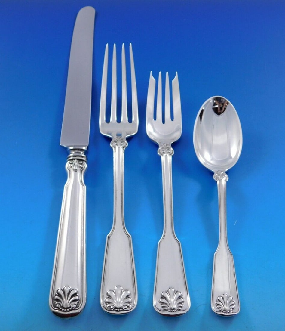 Tiffany & Co Shell & Thread Sterling Silver 4-Pc Place Setting: Tiffany & Co Shell & Thread Sterling Silver 4-Pc Place Setting Enhance your dining experience with this exquisite 4-piece dinner size place setting from Tiffany & Co., featuring the elegant Shell & Th