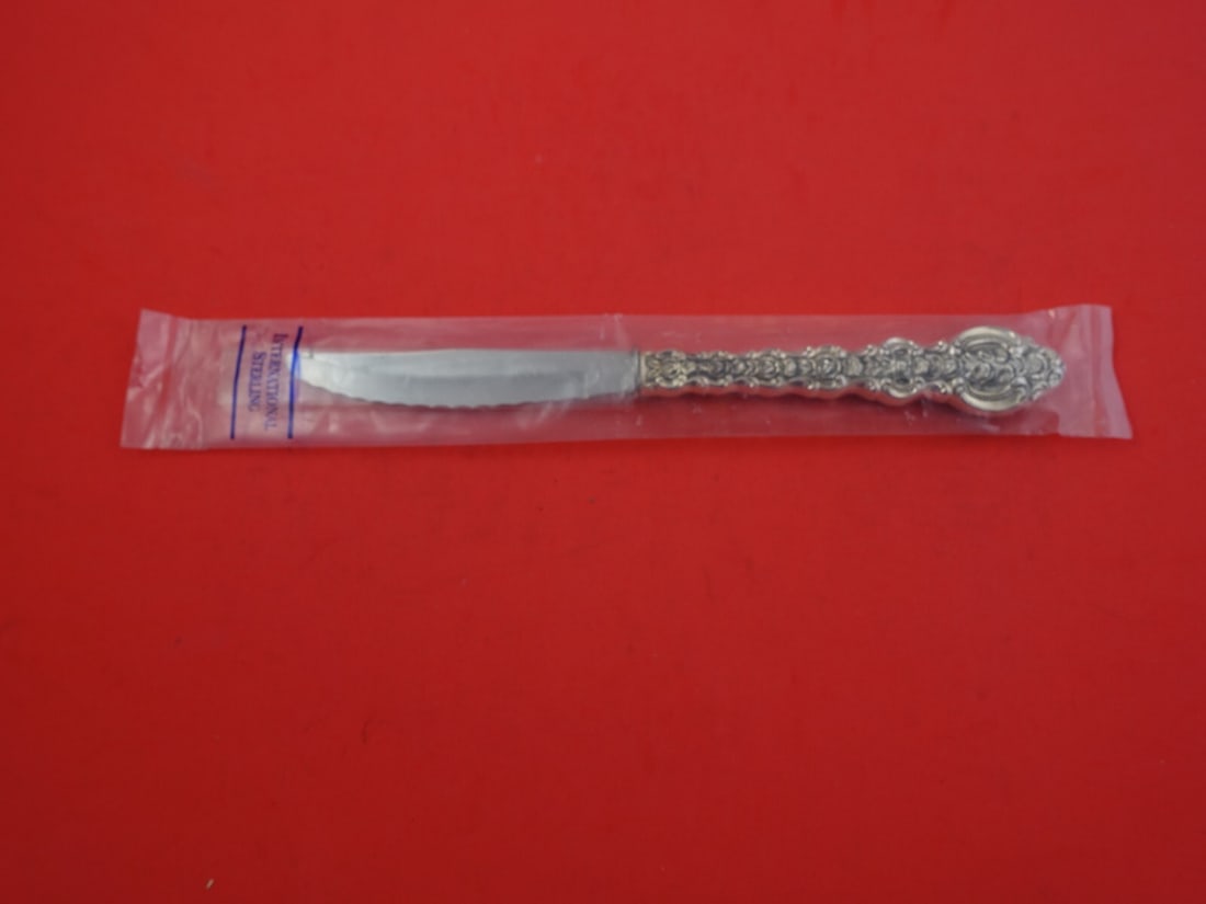 International King Louis Sterling Silver Steak Knife 8 5/8" New: International King Louis Sterling Silver Steak Knife 8 5/8" New This elegant steak knife is part of the King Louis pattern by International Sterling, crafted from high-quality sterling silver (.925). 