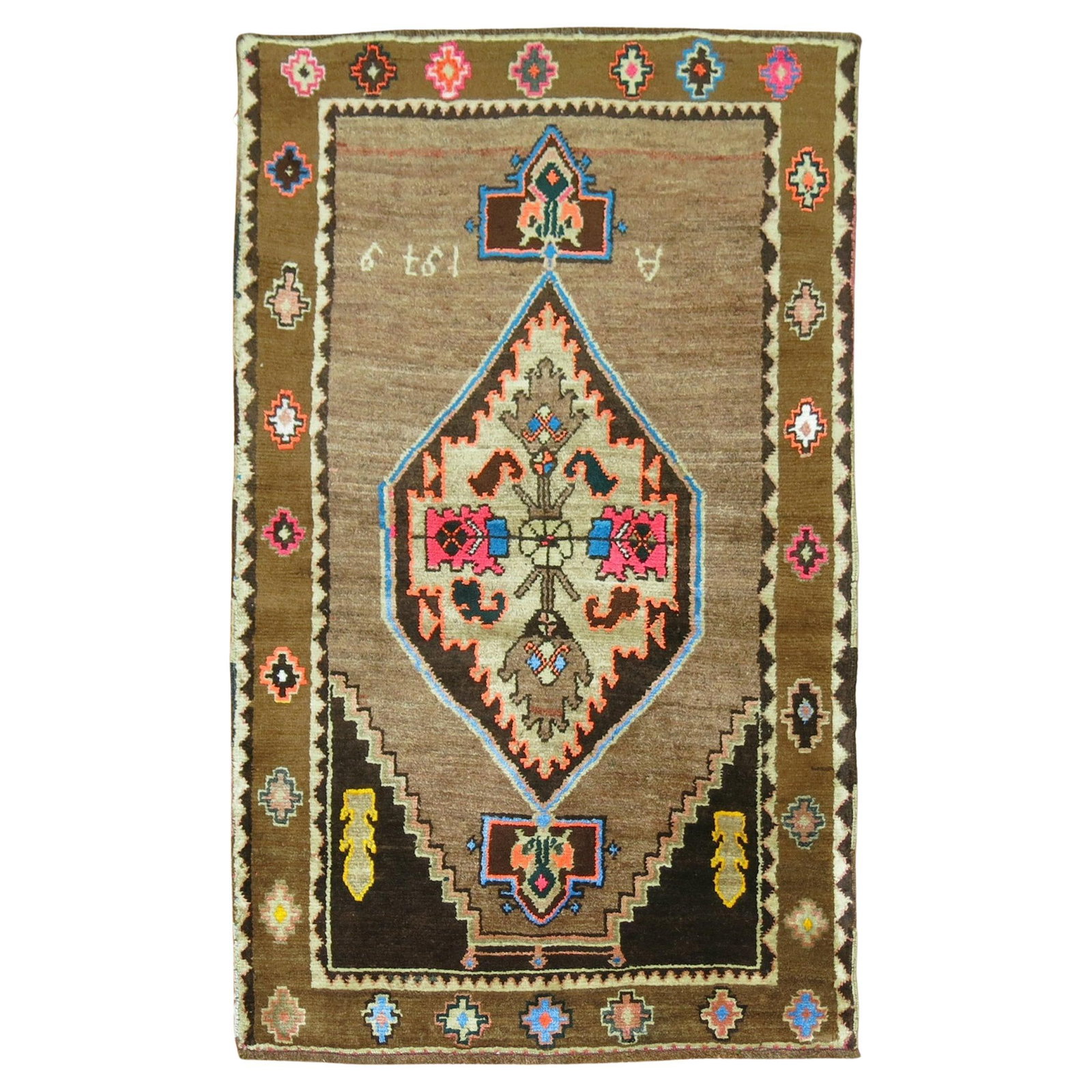 1979 Turkish Kars Rug Hand-Knotted Wool 34x53 in: 1979 Turkish Kars Rug Hand-Knotted Wool 34x53 in This exquisite Turkish Kars rug, dated 1979, showcases a charming archaistic style and is hand-knotted from high-quality wool. With its compact dimensi