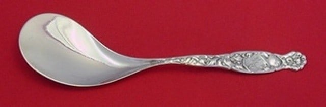 Whiting Heraldic Sterling Silver 10 Inch Fried Oyster Server: Whiting Heraldic Sterling Silver 10 Inch Fried Oyster Server This exquisite 10" Fried Oyster Server is crafted from high-quality Sterling Silver and features the elegant Heraldic pattern by Whiting.
