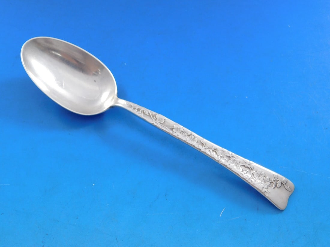 Tiffany & Co. Lap Over Edge Sterling Silver Teaspoon 6" Marigold Flowers: Tiffany & Co. Lap Over Edge Sterling Silver Teaspoon 6" Marigold Flowers This exquisite Tiffany & Co. teaspoon features the elegant Lap Over Edge pattern and showcases a beautiful acid etched design