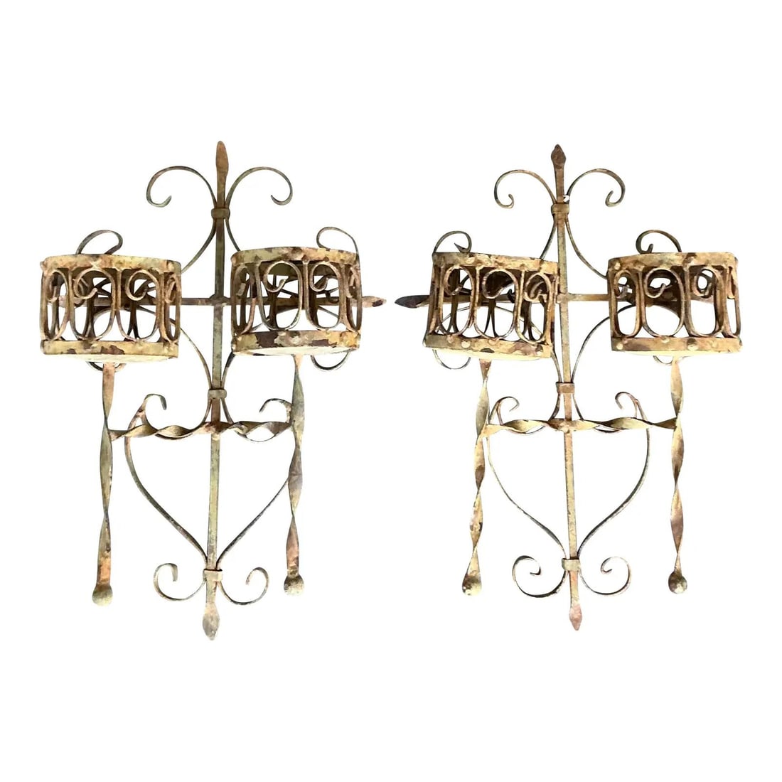 Pair of Spanish Revival Wrought Iron Wall Candle Sconces with Fleur de Lis Detail: Pair of Spanish Revival Wrought Iron Wall Candle Sconces with Fleur de Lis Detail This pair of vintage wrought iron wall candle sconces showcases Spanish Colonial and Mediterranean-inspired design wit