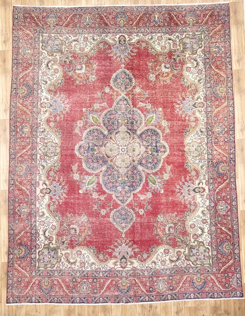 Hand Knotted Wool Vintage Floral Area Rug 9'7 x 12'7: Hand Knotted Wool Vintage Floral Area Rug 9'7 x 12'7 This semi-antique handmade Oriental area rug features a traditional floral pattern in muted tones of red, cream, purple-navy, brown, green, and blu