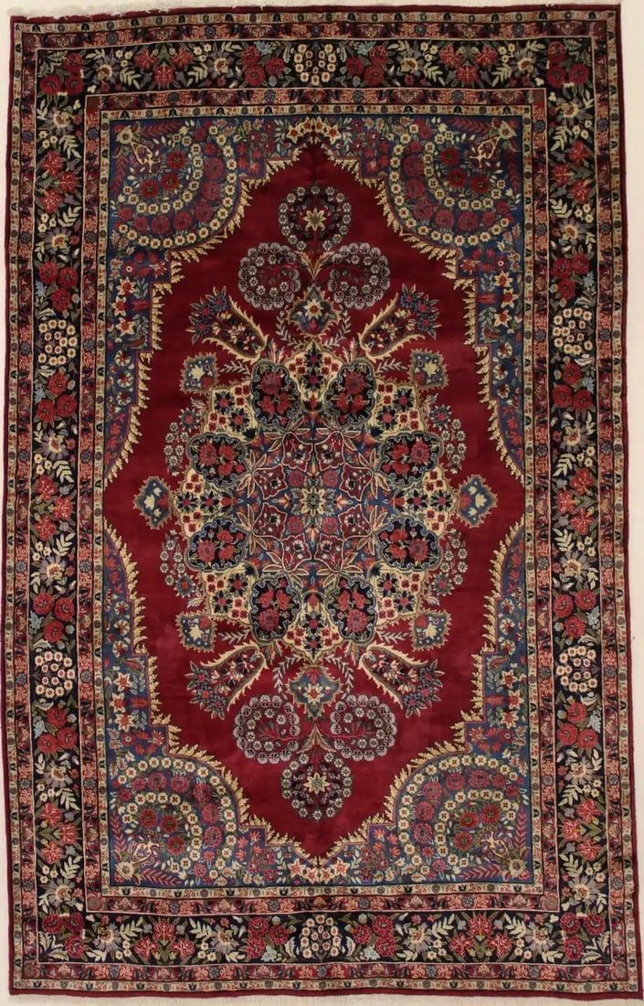 Hand-Knotted 6'5 x 10'5 Vintage Floral Wool Oriental Area Rug: Hand-Knotted 6'5 x 10'5 Vintage Floral Wool Oriental Area Rug This one-of-a-kind area rug features a traditional floral pattern in a palette of red, royal blue, cream, watermelon, khaki, marigold, and