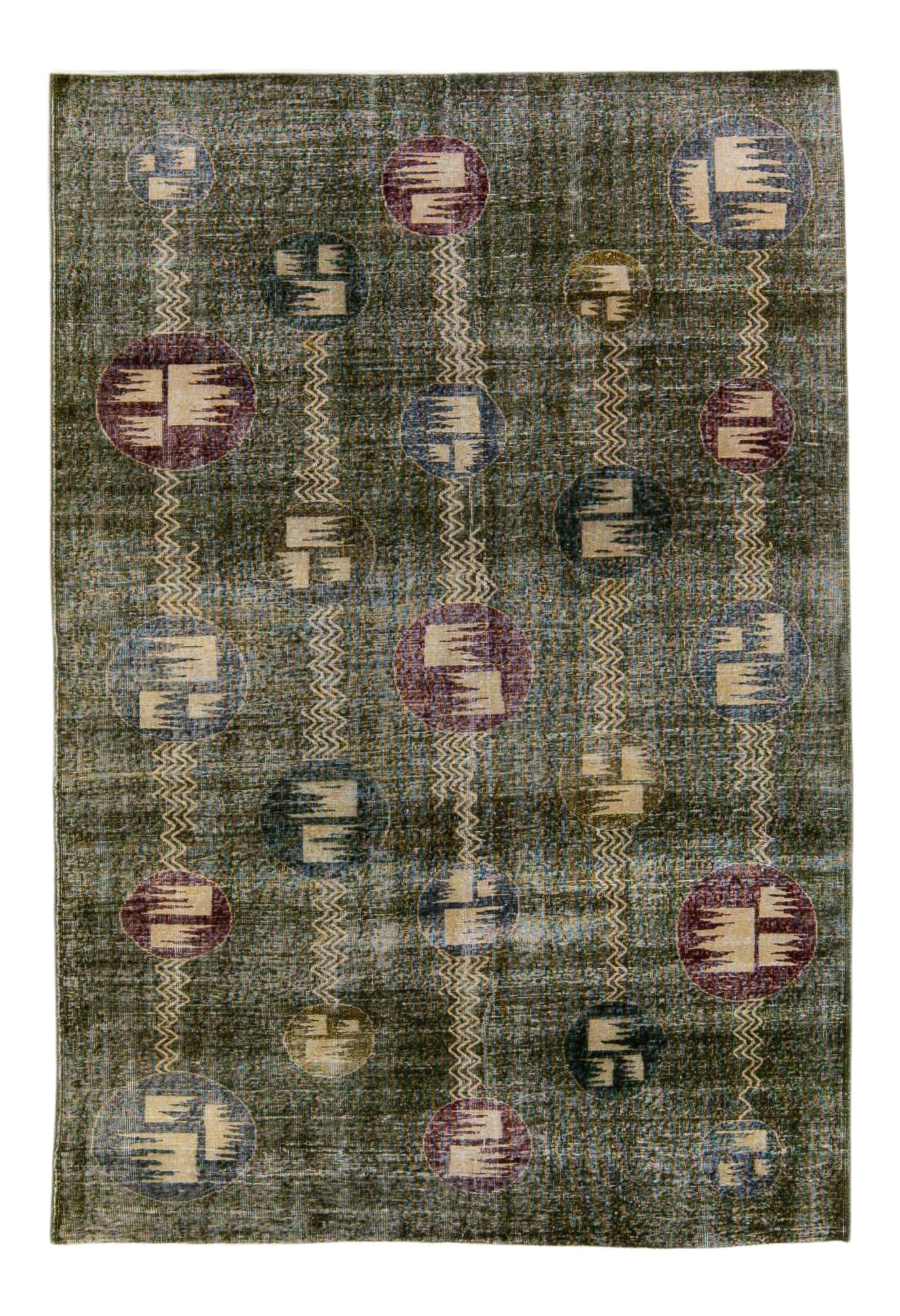 Vintage Turkish Deco Hand-Knotted Wool Rug Green 6'10 x 10'1: Vintage Turkish Deco Hand-Knotted Wool Rug Green 6'10 x 10'1 This stunning vintage Deco Turkish rug showcases a beautiful hand-knotted design in rich green wool, accentuated with vibrant red, blue, ye