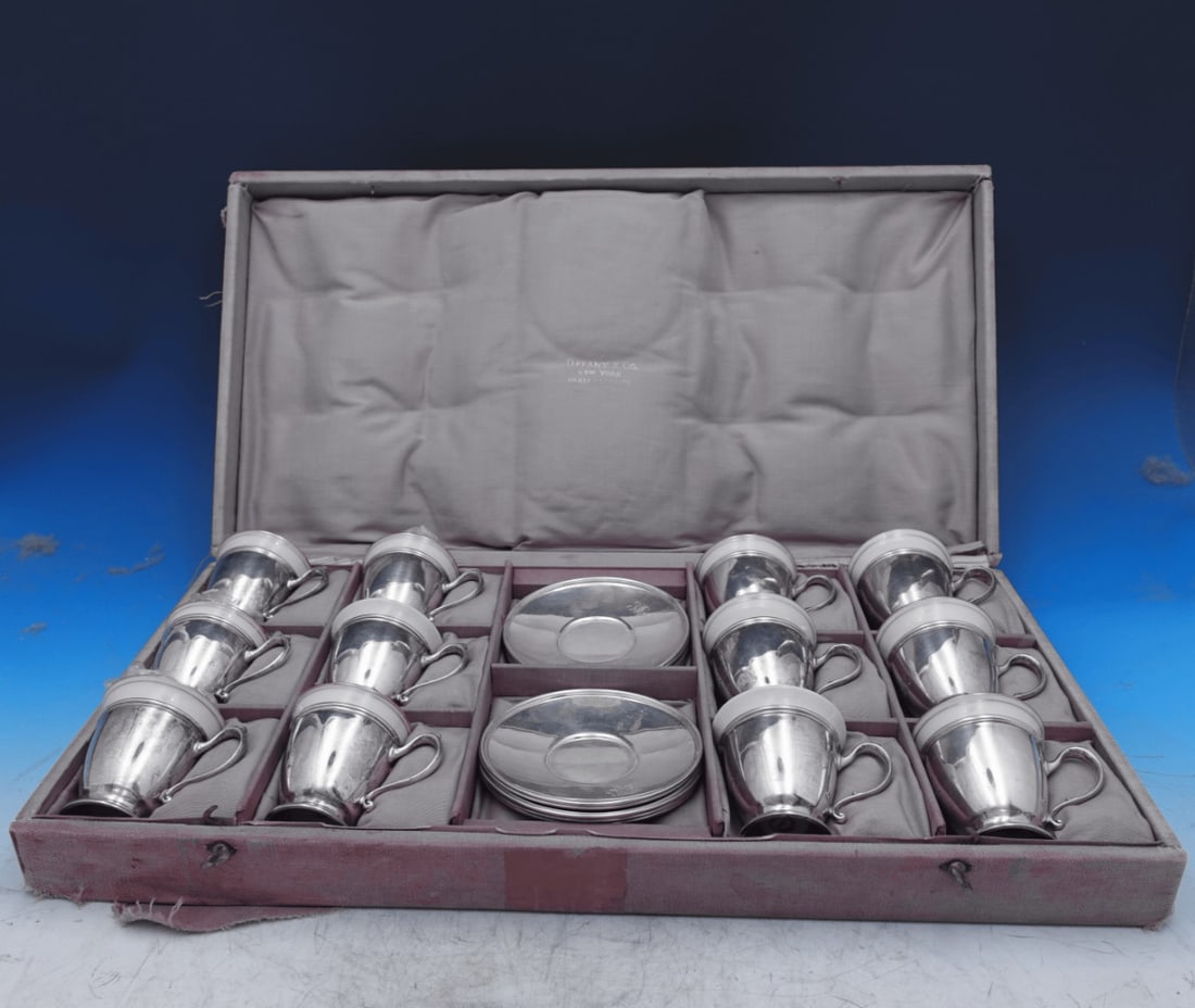 36 Piece Tiffany Co Sterling Silver Demitasse Set with Lenox Liners: 36 Piece Tiffany Co Sterling Silver Demitasse Set with Lenox Liners A Tiffany & Co. sterling silver demitasse set presented in the original fitted case. The set includes 12 demitasse cups, 12 saucers,